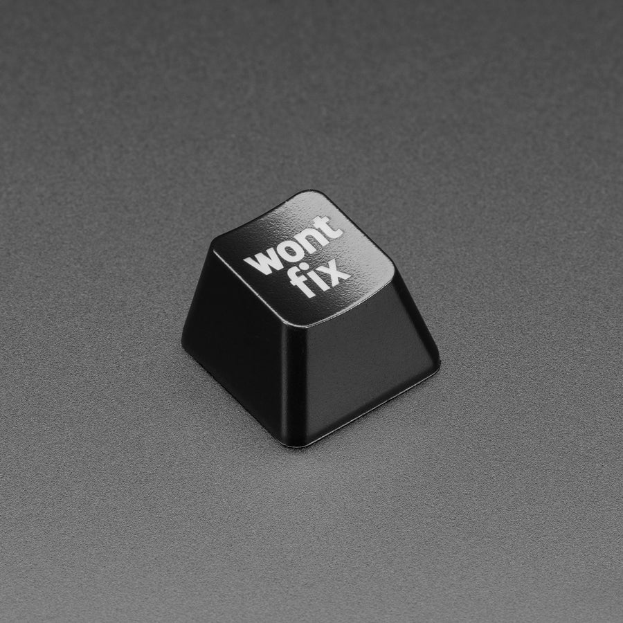Etched Glow-Through Keycap with "wont fix" Text - MX Compatible Switches